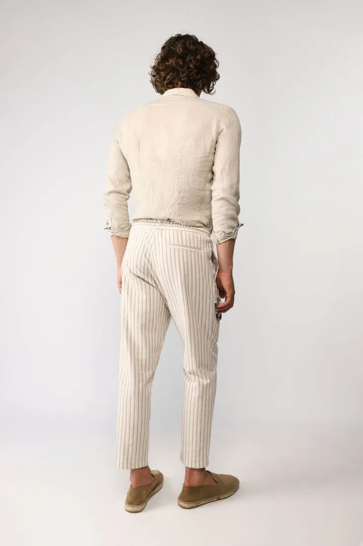Pantaloni slim-fit a righe con coulisse e catena